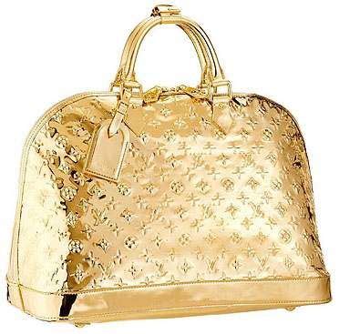 bolso alma louis vuitton dorado